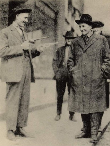 "Two Gun" Sid Hatfield posing for new reporters