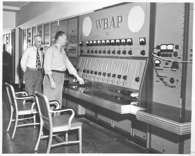 Roy Bond, assistant master control supervisor, and R.C. Stinson, director of engineering, starts first broadcast of WBAP-TV from new building at 3900 Barnett, 6 a.m., Sunday, 06/19/1949.
Courtesy UTA Libraries Digital Gallery