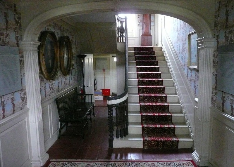 The house's central hallway and staircase. 