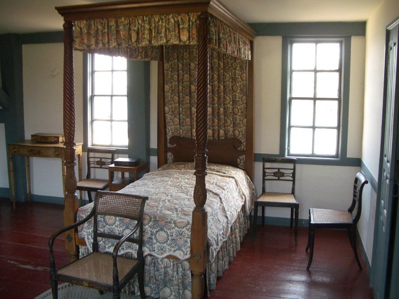 One of the many bedrooms located within the mansion. 