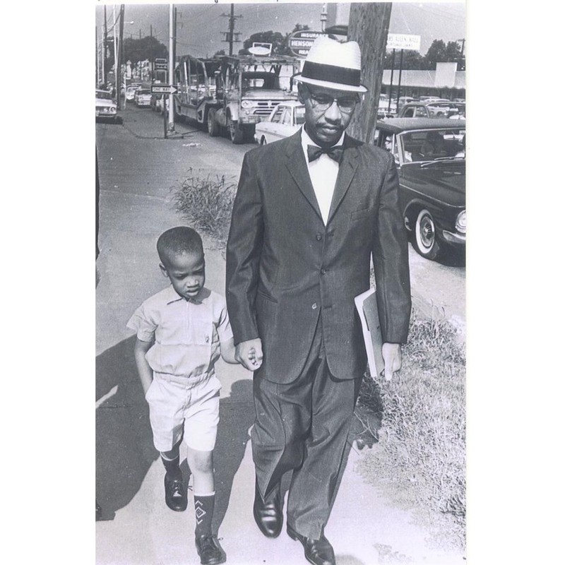 Dr. Sonnie W. Hereford III and his his son Sonnie Hereford IV return home after their first attempt to integrate Huntsville's Fifth Avenue School was blocked by Alabama State Troopers.