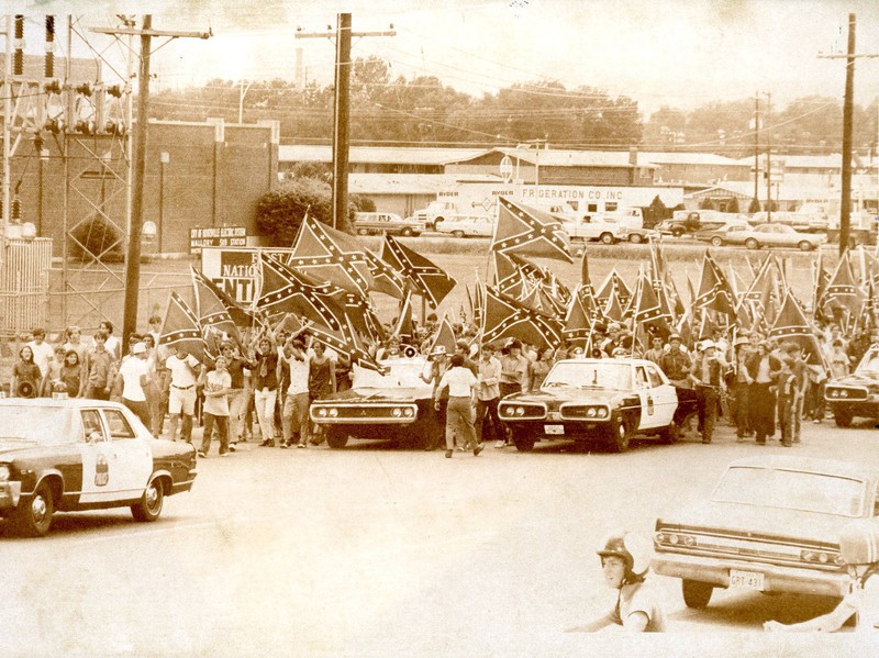 In 1971, Butler High students demonstrate in support of the use of the Confederate battle flag, after Judge Grooms ruled against the practice.