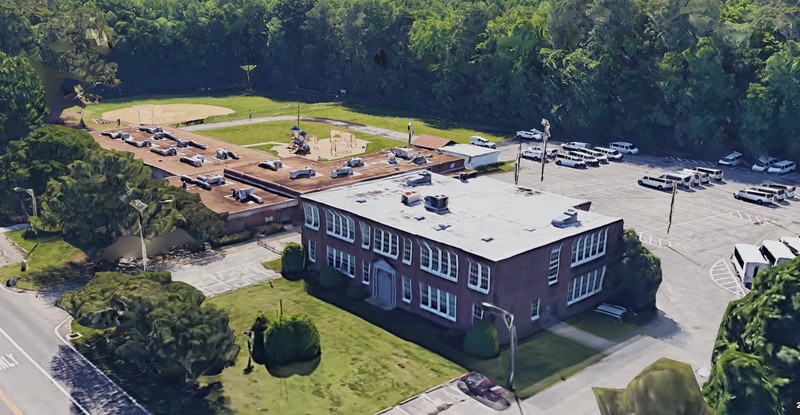 An angled overhead view of the former Court House Elementary School complex.