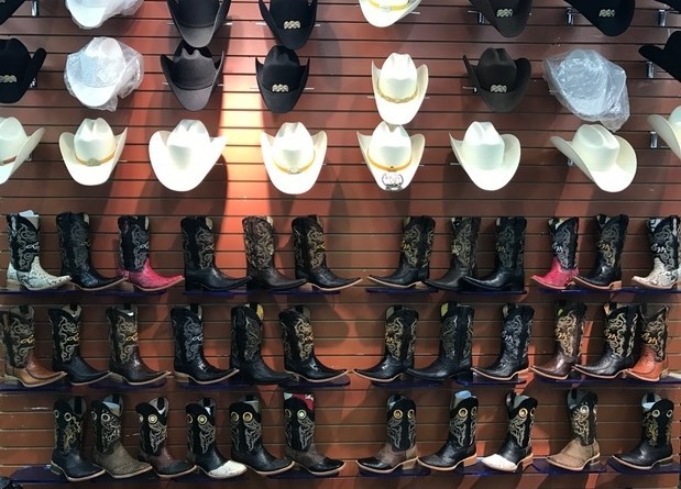 Traditional clothing like boots and cowboy hats, an ode to the Southwest, can be found at many stores in the discount mall. Source: Ahrensdorf, Lucia. Little Village. South Side Weekly. October 01, 2014. Accessed May 30, 2019. https://southsideweekly