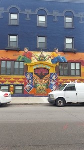 Repainted in 2017, a new mural modeled after the original now covers the front of what used to be Casa Aztlan (Credits: Elena Andrews, 2019)