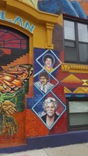 The right side of the old entryway to Casa Aztlan depicts new portraits of contemporary local activists (Credits: Elena Andrews, 2019) 