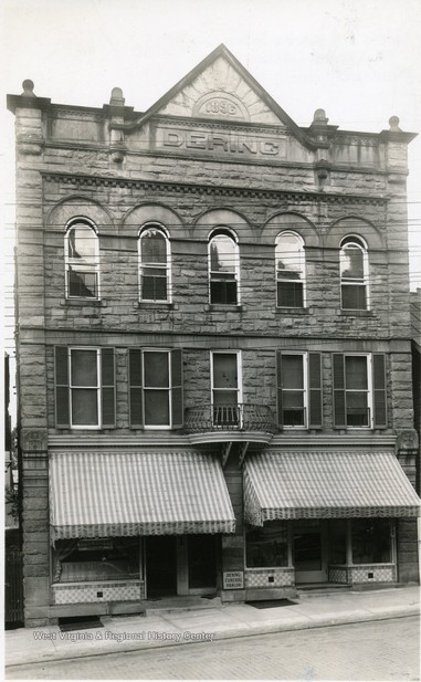 Dering Building ca. 1955-1965. Note the sign on the ground floor for the Dering Funeral Parlor