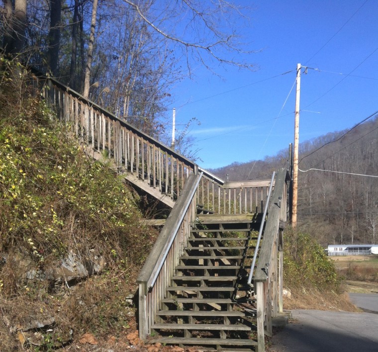 The steps, near Betty McCoy's home, which lead up to Sally's grave