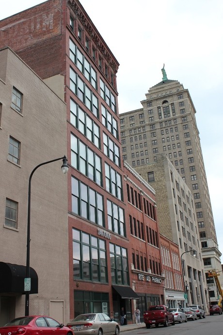 The Meldrum name remains etched into the brick on the top floors of what is now The Antonio luxury apartment building.