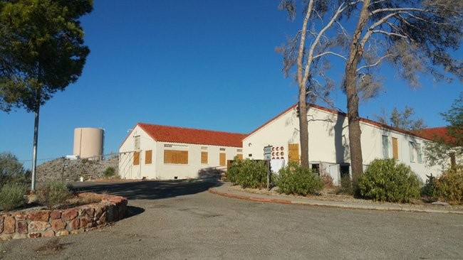 The boarded-up Six Companies Hospital, circa 2016. (Source: PlacesThatWere.com)