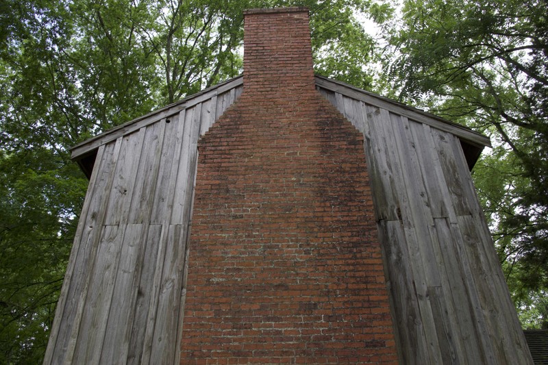 Enslaved people built the chimney on the side of the home by hand.
