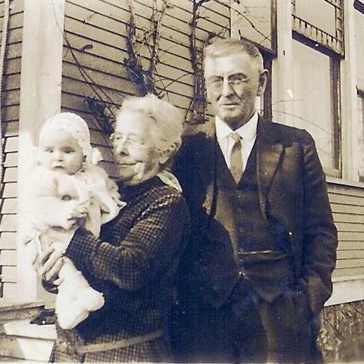 May and Charles Hubbard with grandchild