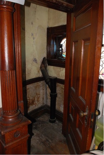 Telephone booth in Cross House near north entry in 2010 photograph for NRHP nomination (Martin)