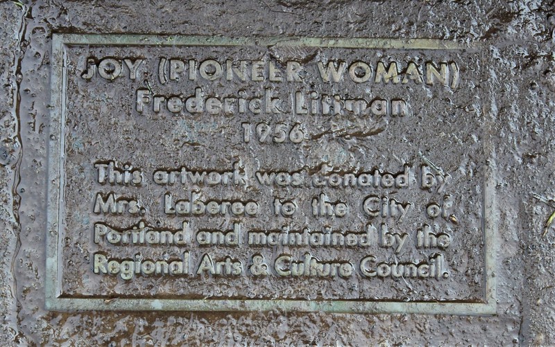 Joy (Pioneer Woman) plaque at base of fountain. Photo by Cynthia Prescott.