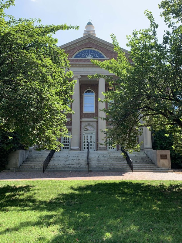 The front view of Manning Hall from the quad between Carolina and Murphy Halls.