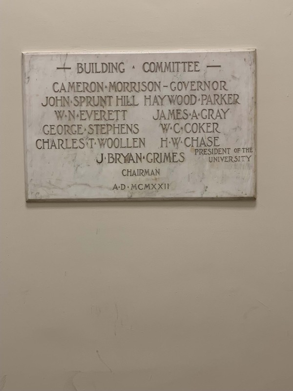 On this building committee plaque just inside Manning Hall's front doors are a few notable individuals. Both W. C. Coker and Charles T. Woollen also lent their names to buildings across UNC's campus.