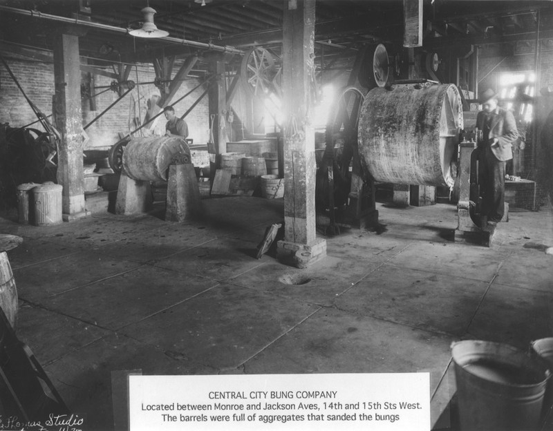 Workers inside the factory. Specialized machines were used for producing the bungs, and they reportedly were closely guarded. Image courtesy of the West Huntington Public Library. 