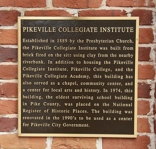 A plaque, commemorating the building's significance 