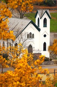 Berkeley Springs Presbyterian Church with gabled roofs and fenestration typical of the Gothic Revival style. Courtesy of Travel Berkeley Springs.