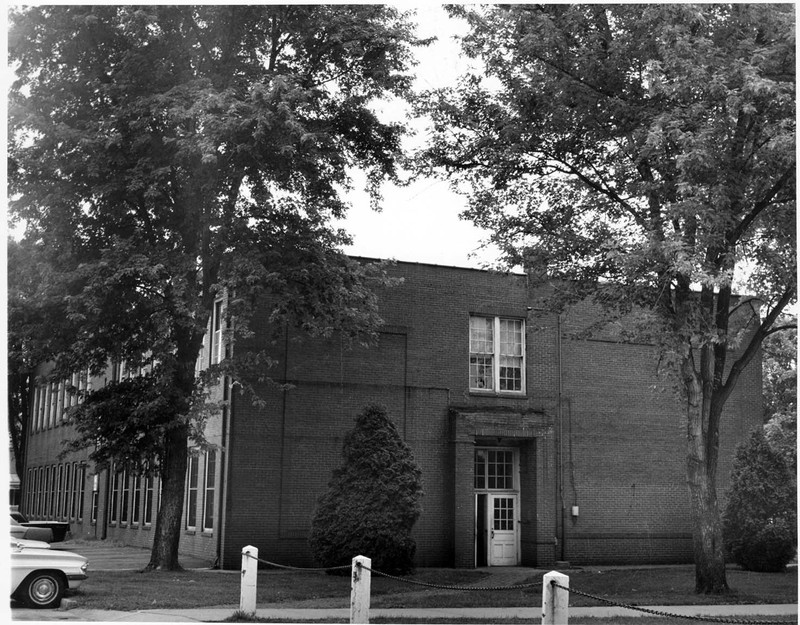 This small brick building, located on the same site, dated to the early 1900s and was originally a commercial store. From 1926 until 1967 it served as Marshall's Music Hall.