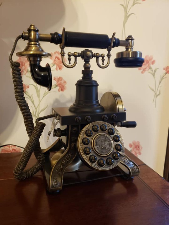 One of the phones assigned to each room