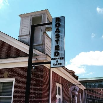 The depot with the recently added sign for its last business, Roasted Cafe