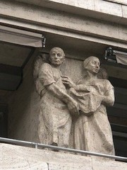 Close-up view of the sculptures on the front of the building