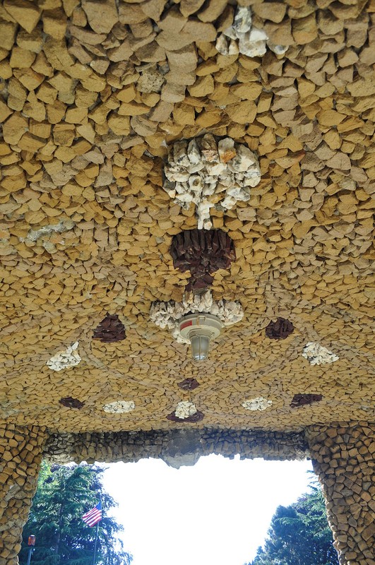 The ceiling of the bandstand features a decorative stone mosaic.