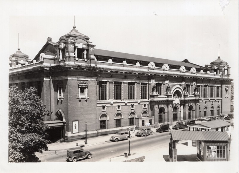 City Auditorium Photo, c. 1920.  b/w.  Photo of the three-story brick building, seen from 4th Street side, located on N corner 4th & Faraon.  Filling station across 4th Street.  

Image provided by the St. Joseph Museums, Inc.