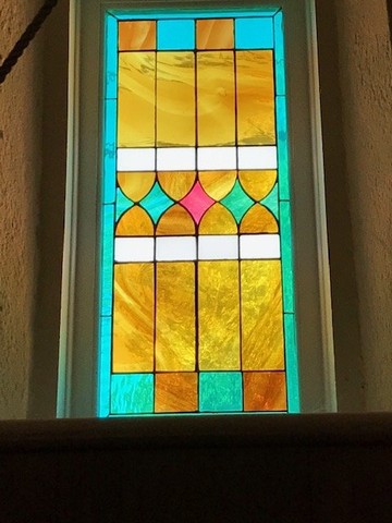 One of the stained glass windows from the church's interior. 
Photo courtesy of Baiba Lennard. 