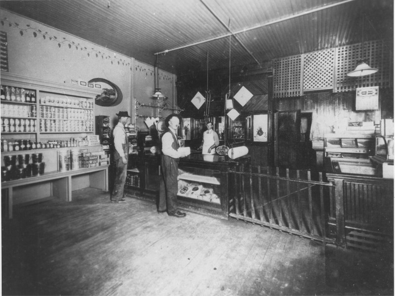 A historic photo of the interior of the N. Frank & Bros Meat Market. 
Photo courtesy of the Lyons Redstone Museum. 