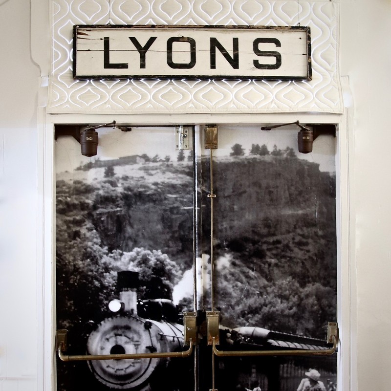 This sign was in the original Train Depot building. It is now on display at the Lyons Redstone Museum. 
Photo courtesy of Baiba Lennard. 