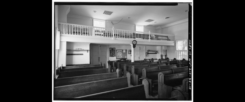 Interior of the church, showing the balcony, 1980