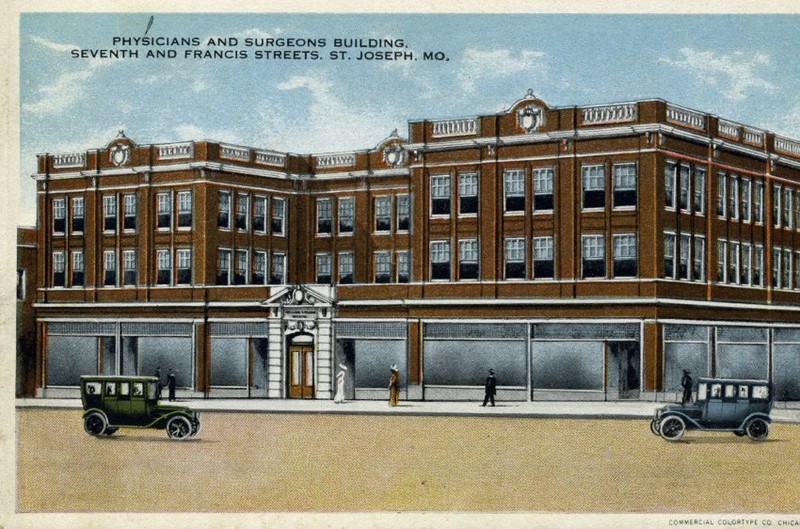 Postcard, Physicians & Surgeons Building, 7th & Francis, c. 1920. The three-story brick building on the corner, glass storefronts on the first story. Stone pillar entrance in the center.  Image provided by the St. Joseph Museums, Inc.