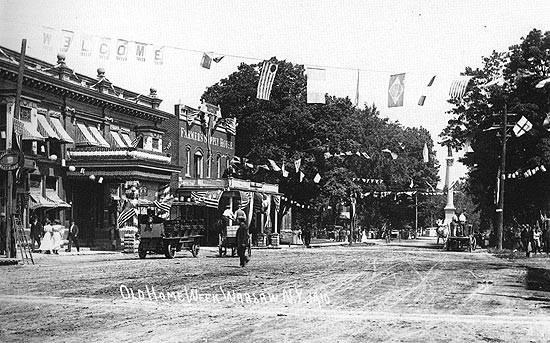 Main Street Warsaw facing North with Civil War Monument, circa 1910