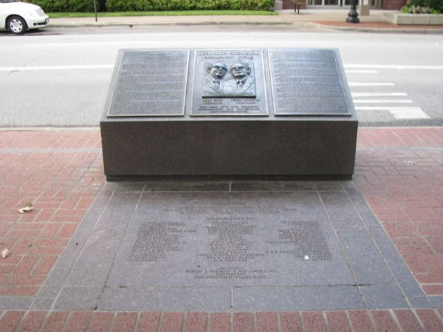 The historical marker features a description of the brothers and the store.