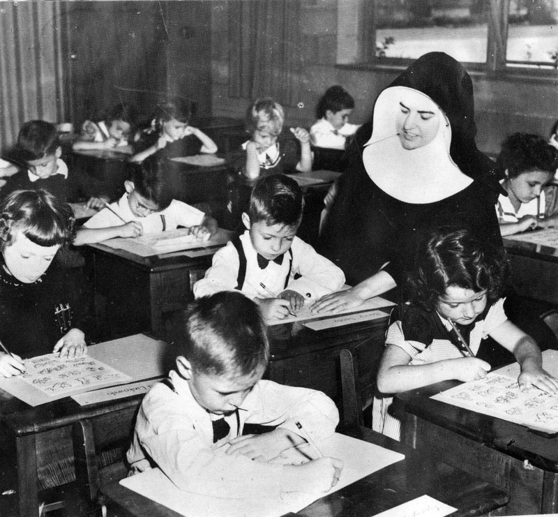 Sister Joyce Braun with pupils at St. Mary's School, c. 1950.