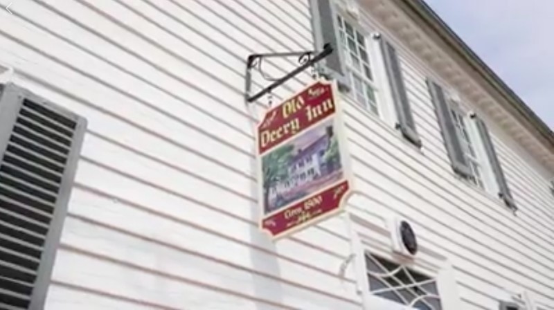 Sign on side of Old Deery Inn
