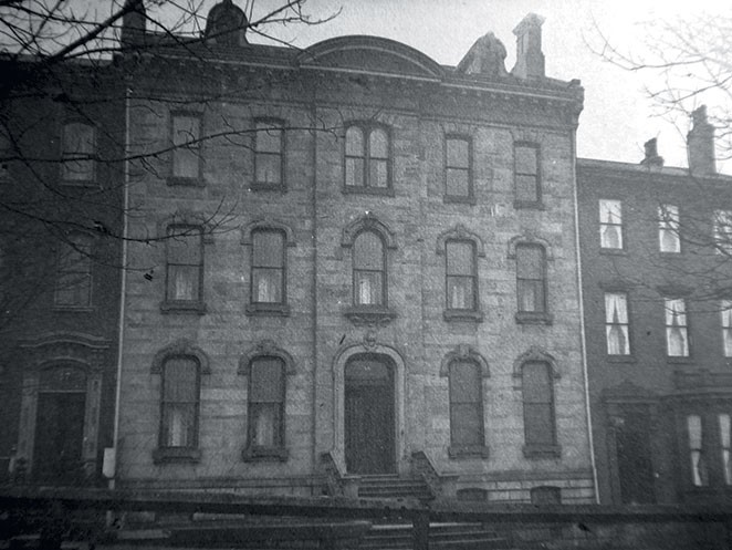 Holmes Hall in 1886/photo by William A. Caldwell Jr. Originally founded as a home for working Protestant boys. It was renamed Holmes Hall for Boys in 1915. After its closing, the organization continues to support similar organizations. 