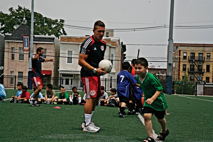 Soccer practice being held at Jose Marti field.