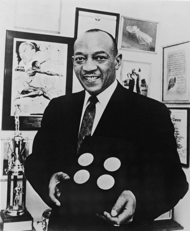 Jesse in the 1950s with all four of his Olympic medals.