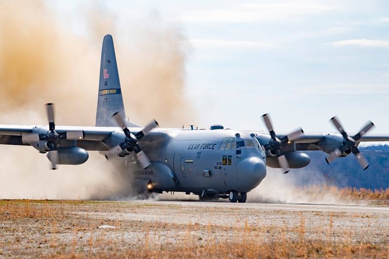 A C-130H lands during training Mar. 28, 2019 at Camp Branch, WV. Camp Branch is a dirt-strip landing and drop zone in Southern West Virginia, capable of hosting joint training for many different types of aircraft and personnel. (U.S. Air National Guard Photo by Senior Airman Caleb Vance)