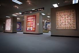 Quilts on display inside the museum.