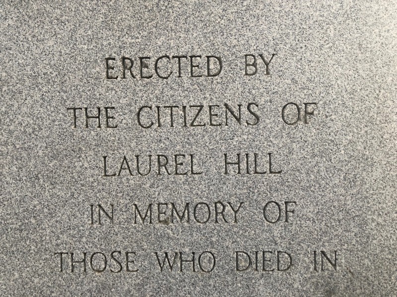 Close-up upon the original inscription showing significant wear