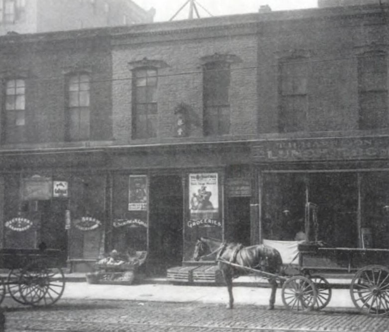 The Chinese-American Society was located in the second story of this building in Old Chinatown, circa 1907. Notice the Chinese characters above the door. 