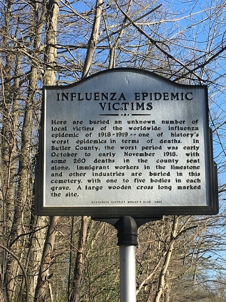 The historical marker that stands on the property of the Black Cross Graveyard tells the story of the influenza in the small town of Winfield in Pennsylvania. The marker recognizes the hundreds of immigrant workers buried on the land.