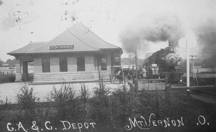 A postcard featuring the depot