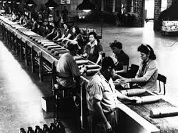 Men and women served as production line workers during World War II