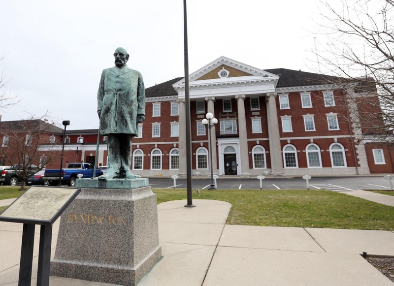 The former depot and the statue of Huntington today