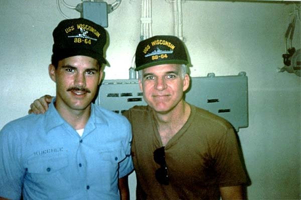 Crewman Steve Kuechle on board the USS Wisconsin with actor-comedian Steve Martin. Photo courtesy of USSWisconsin.org.